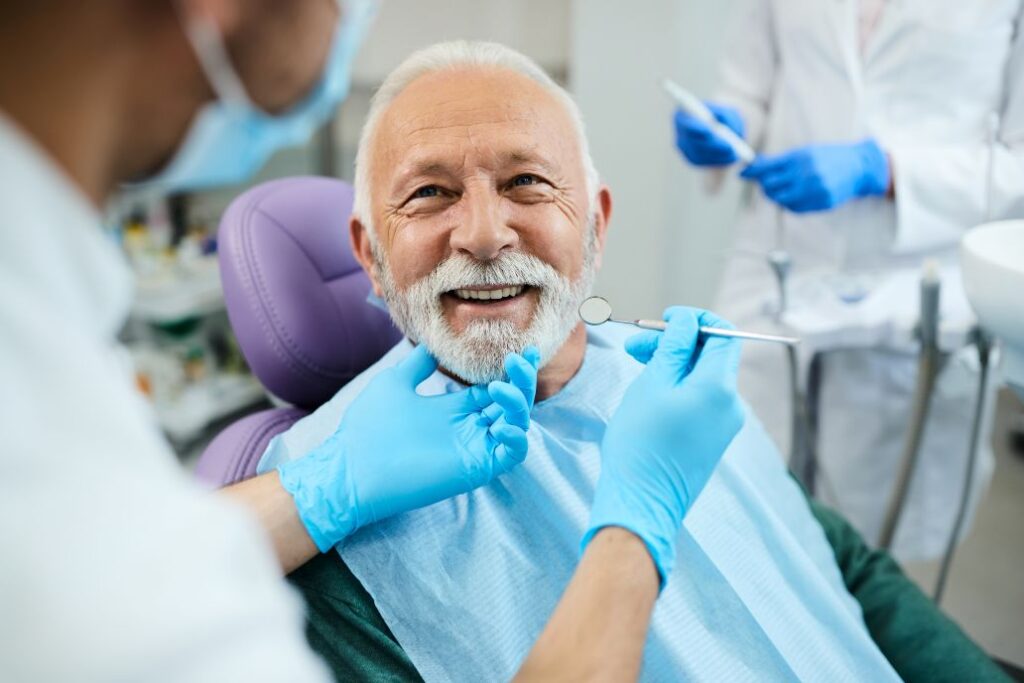 A man having dentures made